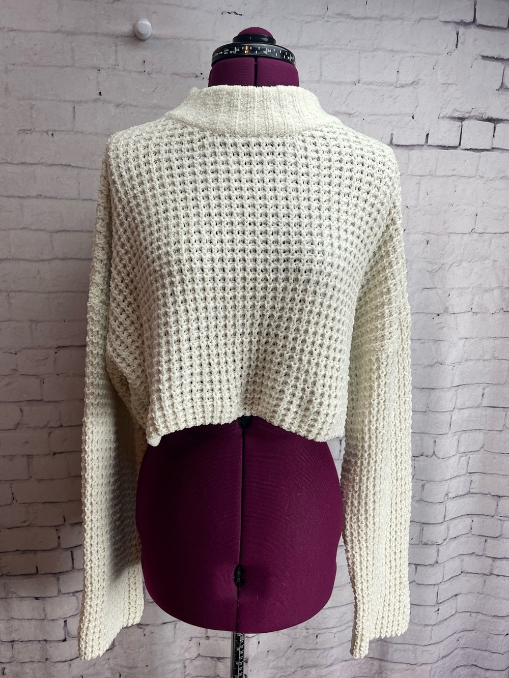 Urban outfitters size small cream color cropped boxy sweater